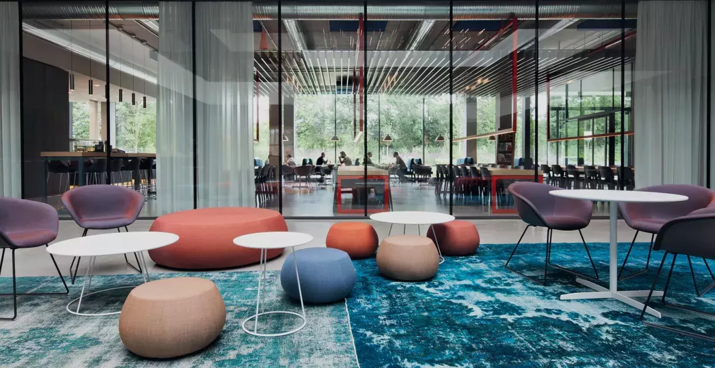 Stylish interior with bold-colored designer sofas